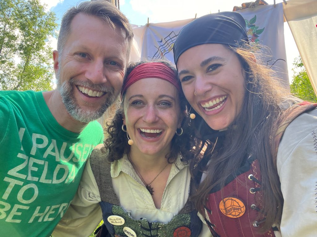 Selfie of Ken smiling with two female pirates